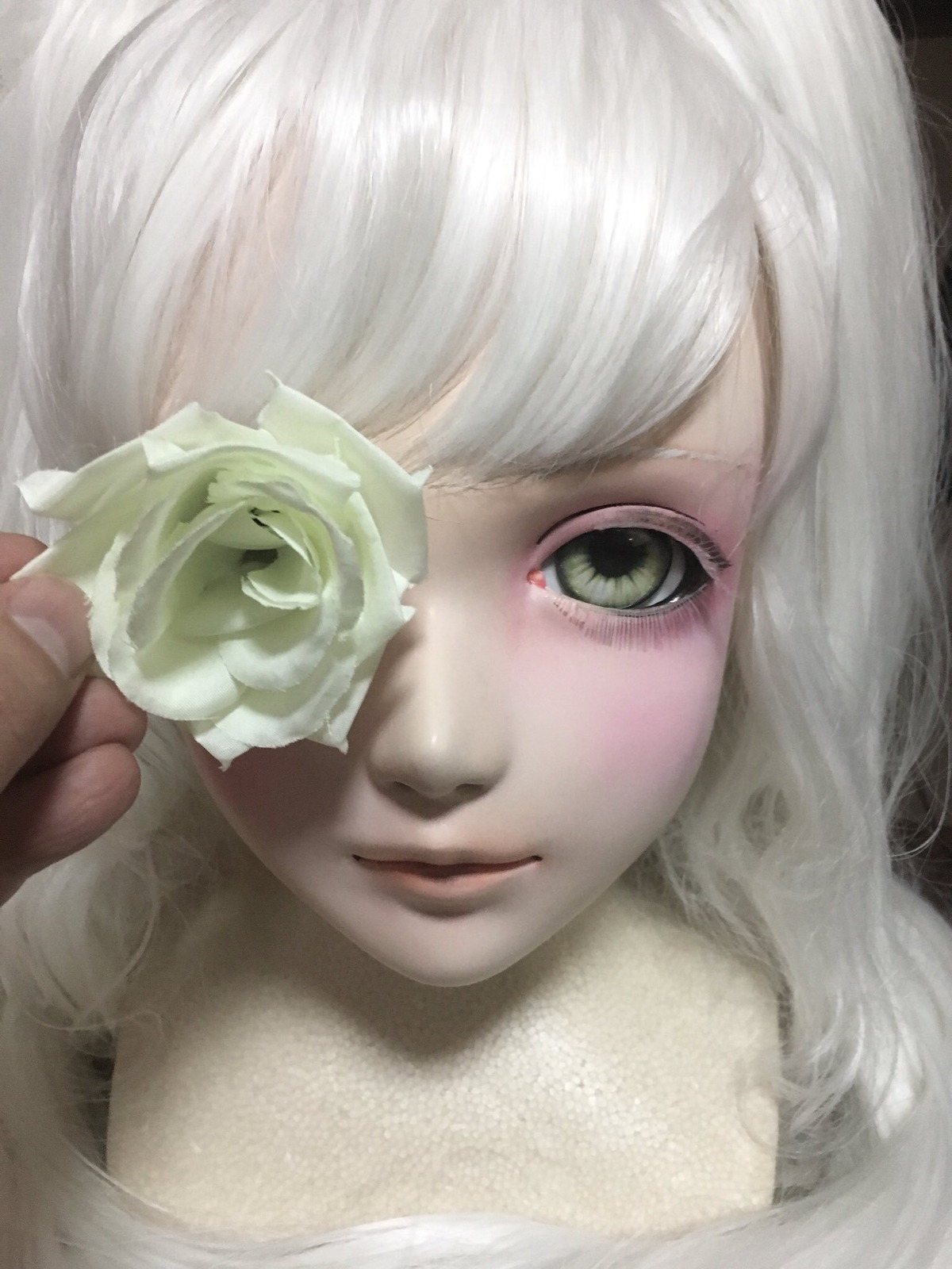 1girl closed_mouth doll eyelashes face flower green_eyes kirakishou lips looking_at_viewer portrait rose solo white_flower white_hair white_rose