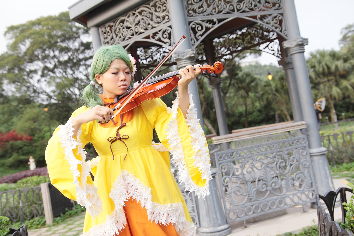 1girl architecture blurry bow_(instrument) closed_eyes day depth_of_field dress east_asian_architecture guitar instrument kanaria long_sleeves music outdoors playing_instrument plectrum realistic solo standing tree violin wide_sleeves yellow_dress