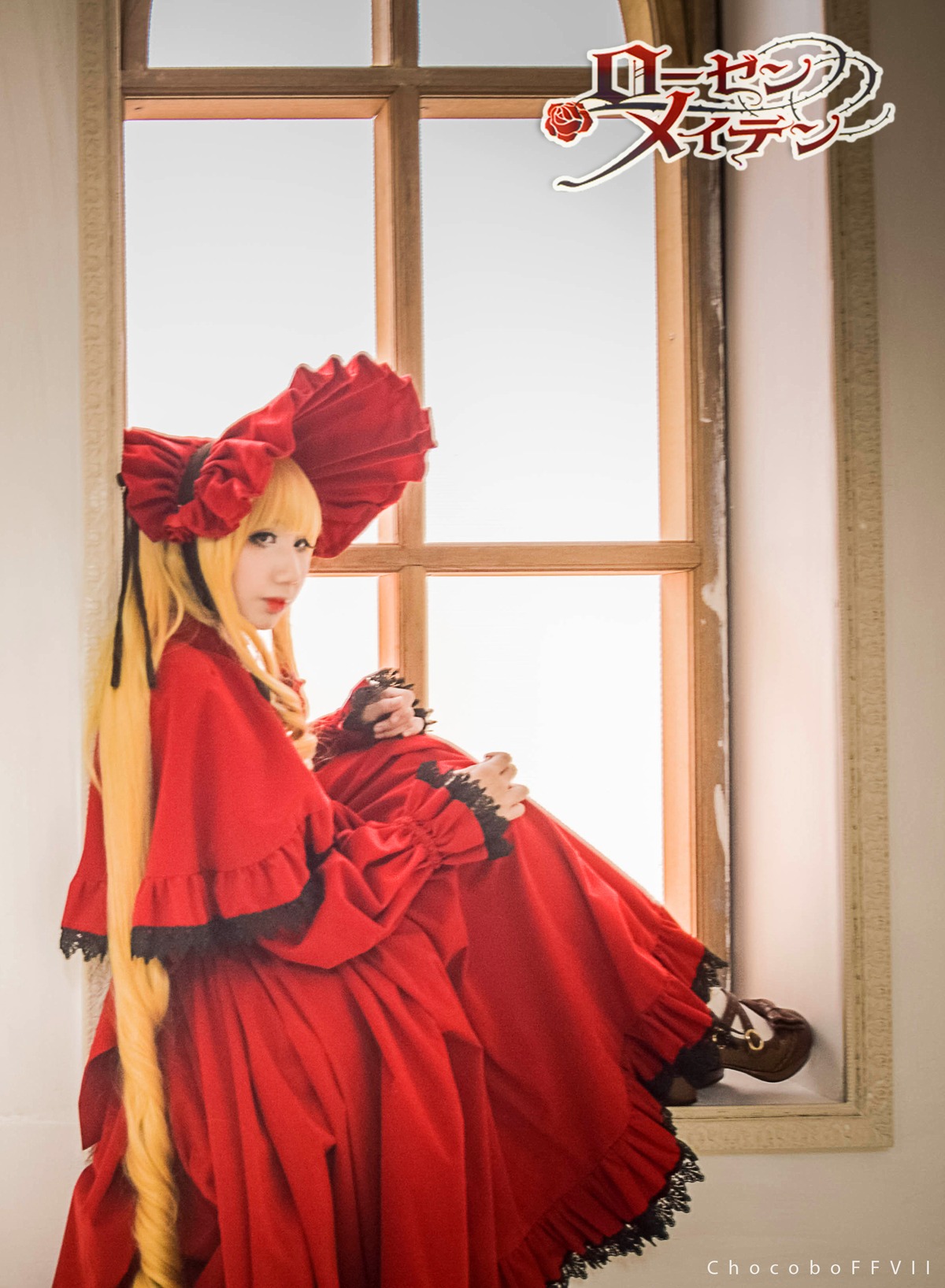 1girl blonde_hair bonnet bow copyright_name doll dress indoors long_hair long_sleeves red_dress shinku solo window