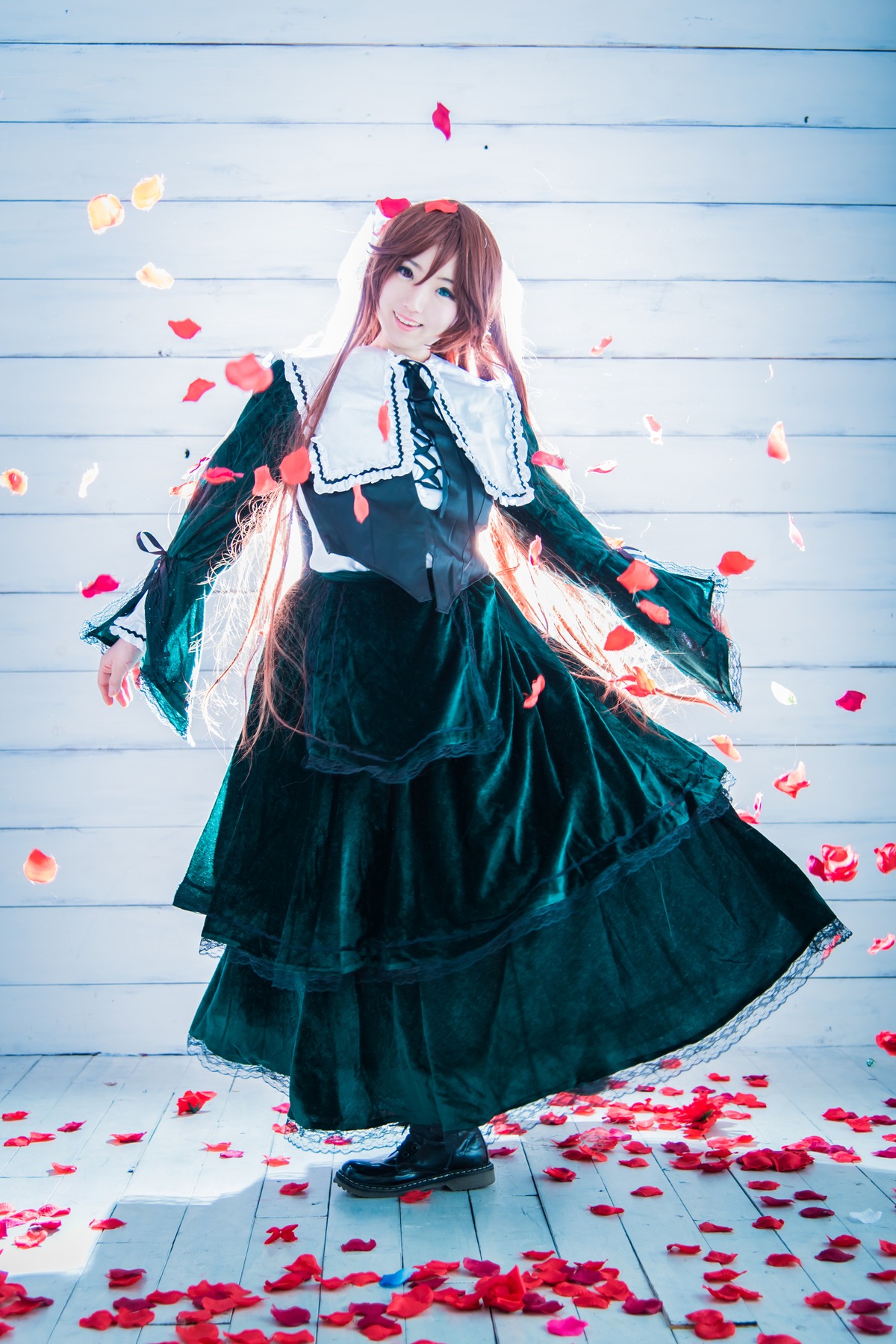 1girl black_footwear blue_eyes brown_hair dress long_hair looking_at_viewer petals shoes smile solo suiseiseki