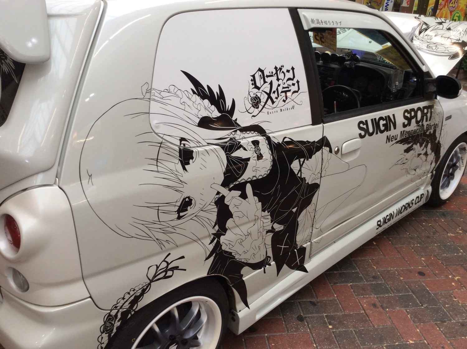 1girl blush car food gothic_lolita ground_vehicle image lolita_fashion monochrome motor_vehicle photo signature solo suigintou traditional_media wings