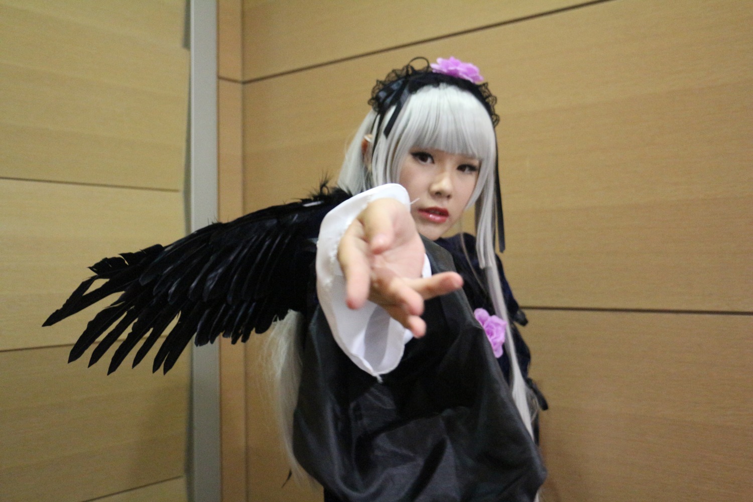 1girl 3d blurry gothic_lolita hairband lips long_hair long_sleeves outstretched_arm photo realistic solo suigintou wings