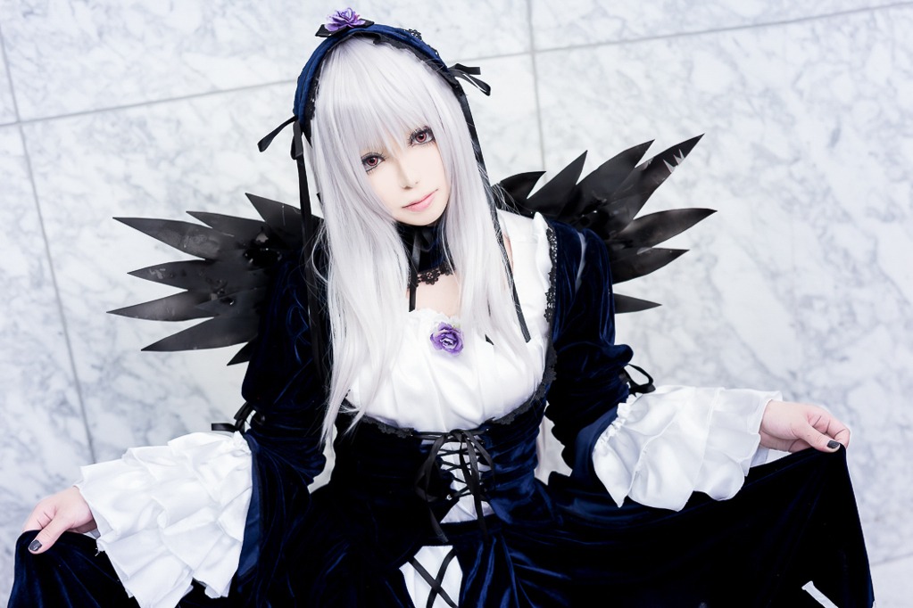 1girl black_dress black_wings cross-laced_clothes detached_collar dress flower frills hairband long_hair long_sleeves looking_at_viewer nail_polish rose silver_hair skirt_hold solo suigintou wings