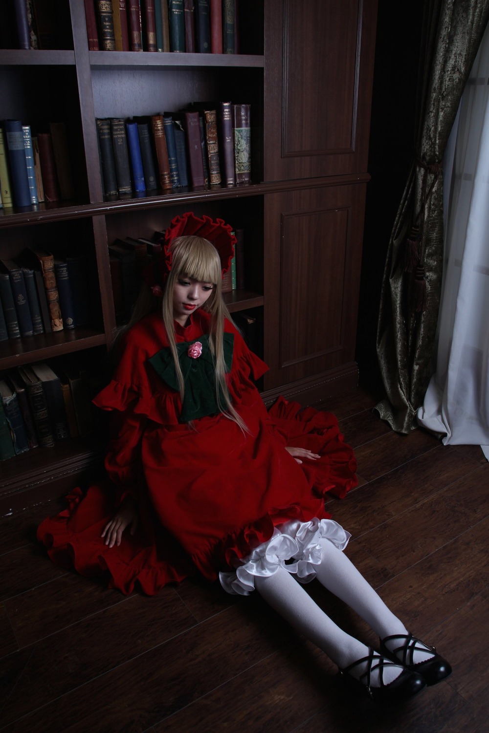 1girl blonde_hair book bookshelf dress frills indoors long_hair pantyhose red_dress shinku shoes sitting solo white_legwear