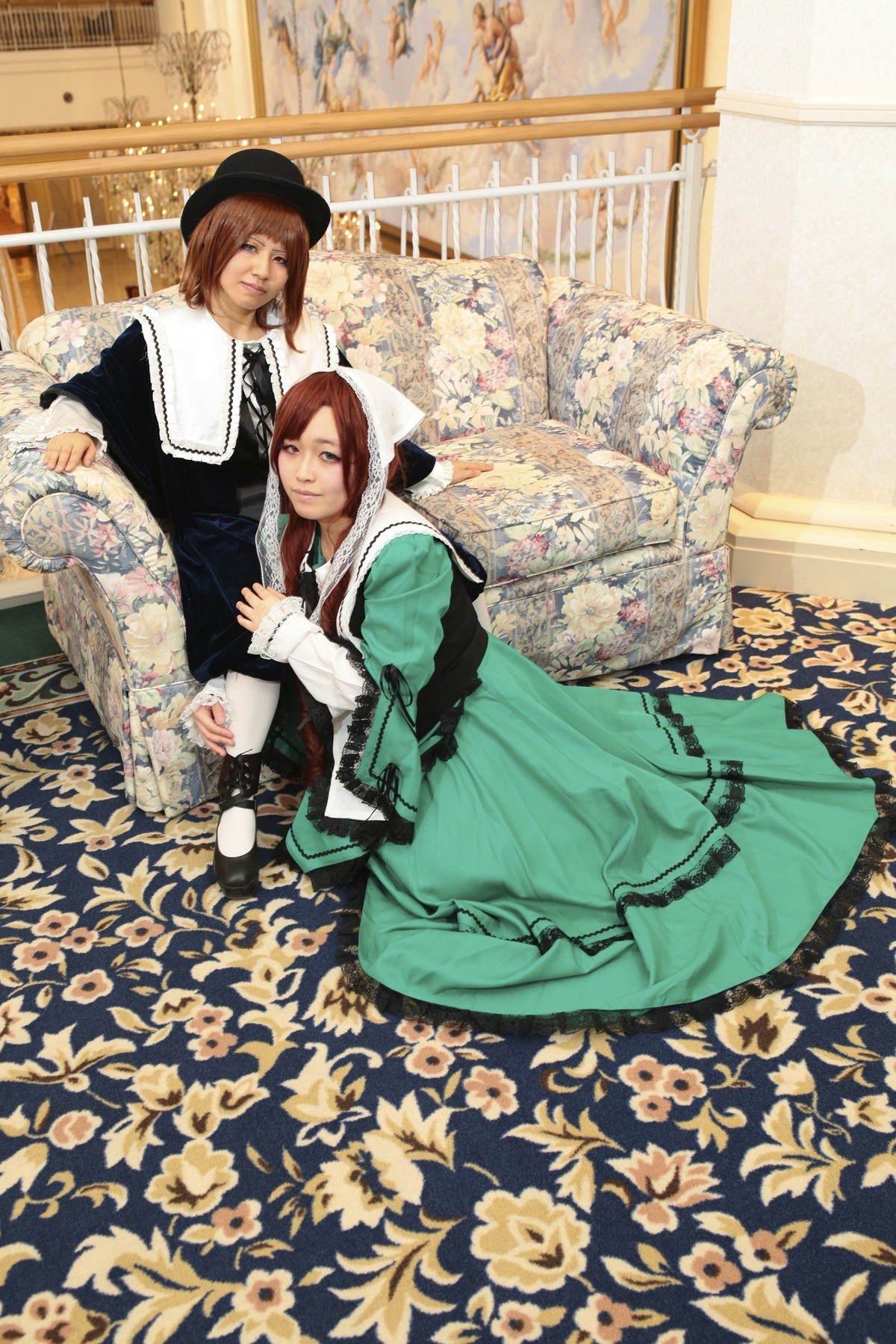 1boy 1girl brown_hair dress flower green_dress hat long_sleeves multiple_cosplay sitting smile tagme