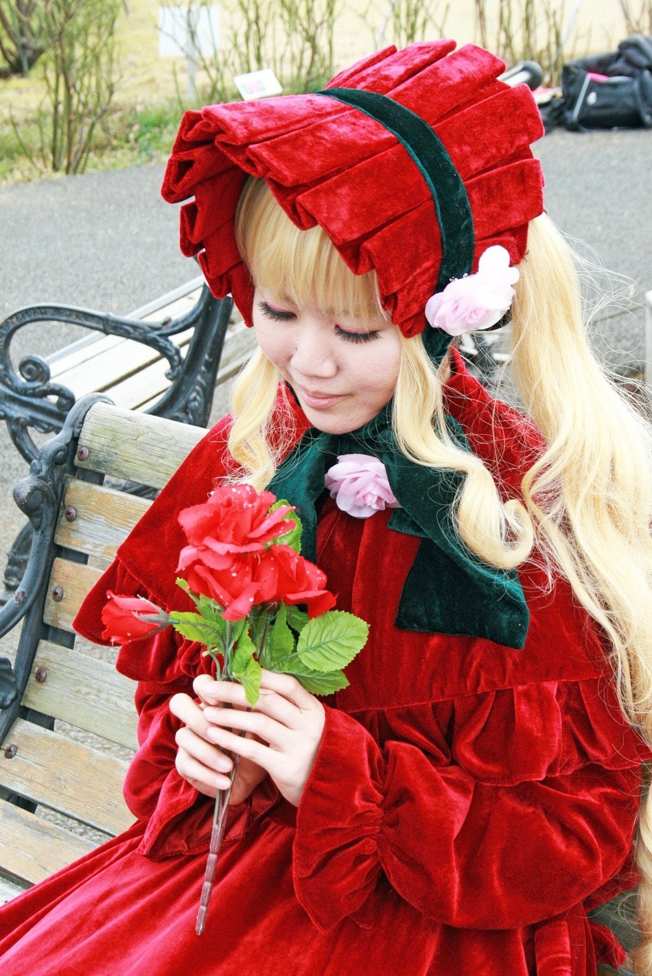 1girl bangs blonde_hair closed_eyes dress flower holding long_hair red_coat rose shinku smile solo traditional_media