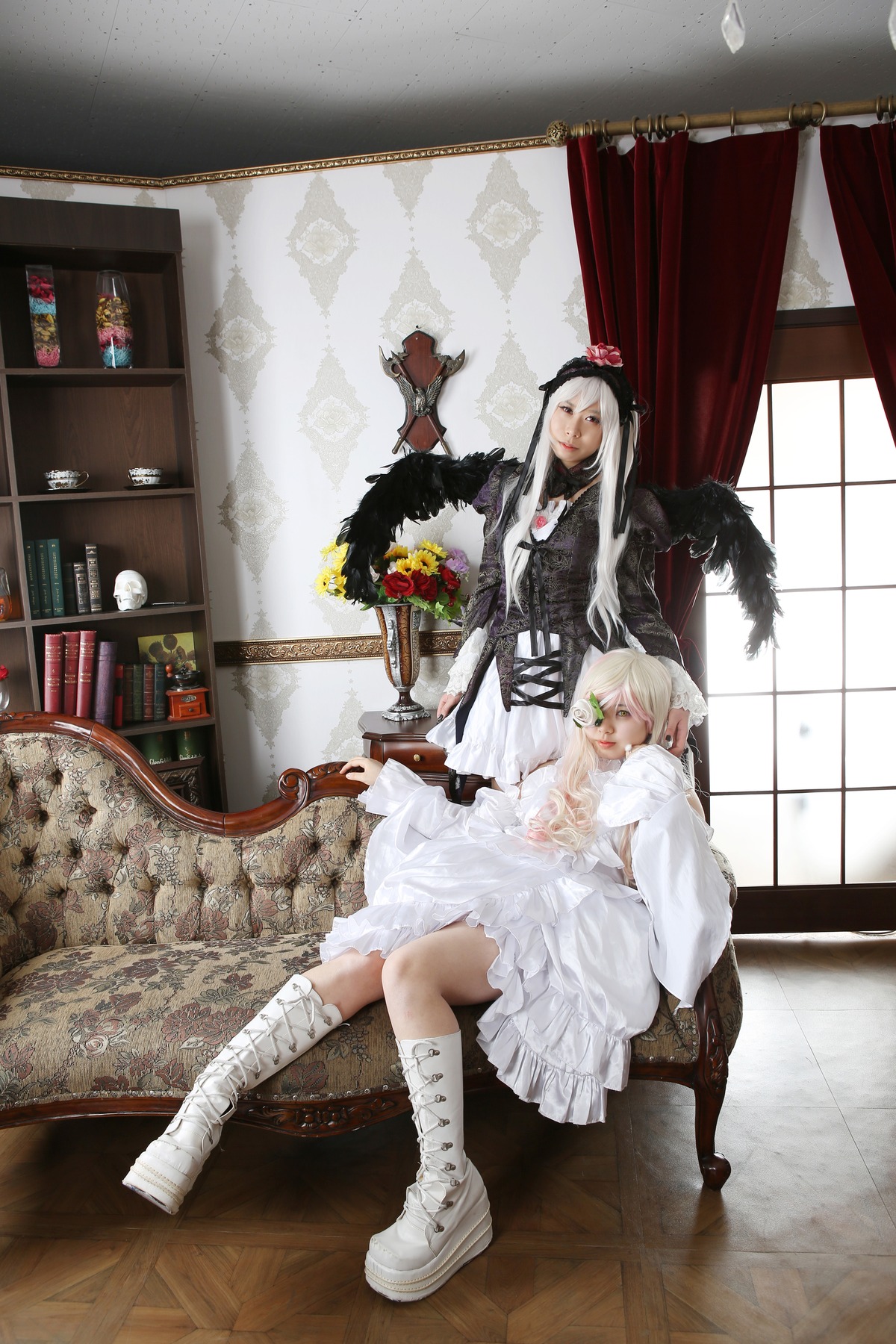 2girls bandages boots dress feathers gloves gun hat indoors long_hair multiple_cosplay multiple_girls sitting tagme white_dress white_hair window