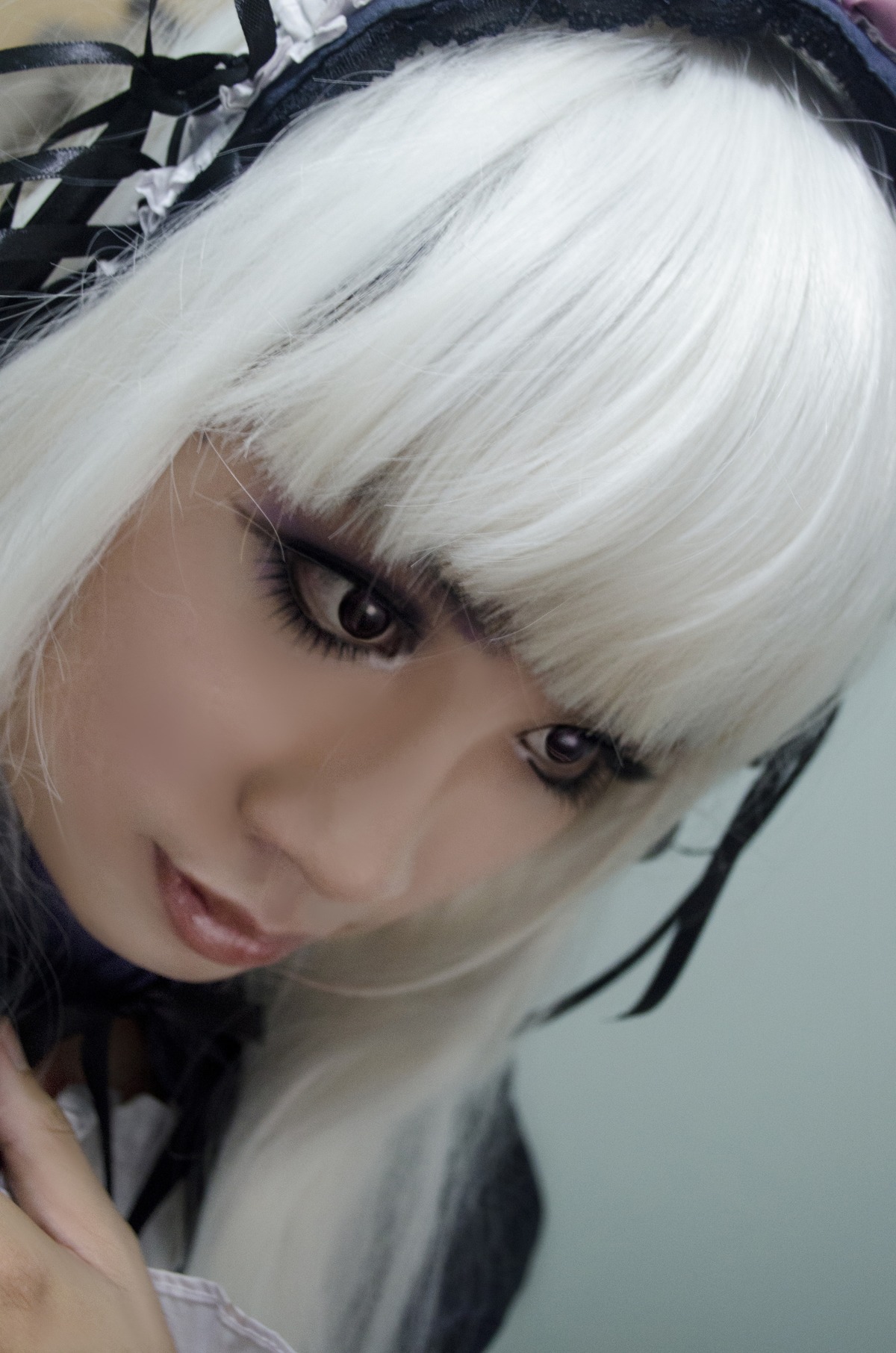 1girl bangs blunt_bangs blurry closed_mouth face lips looking_at_viewer portrait solo suigintou white_hair