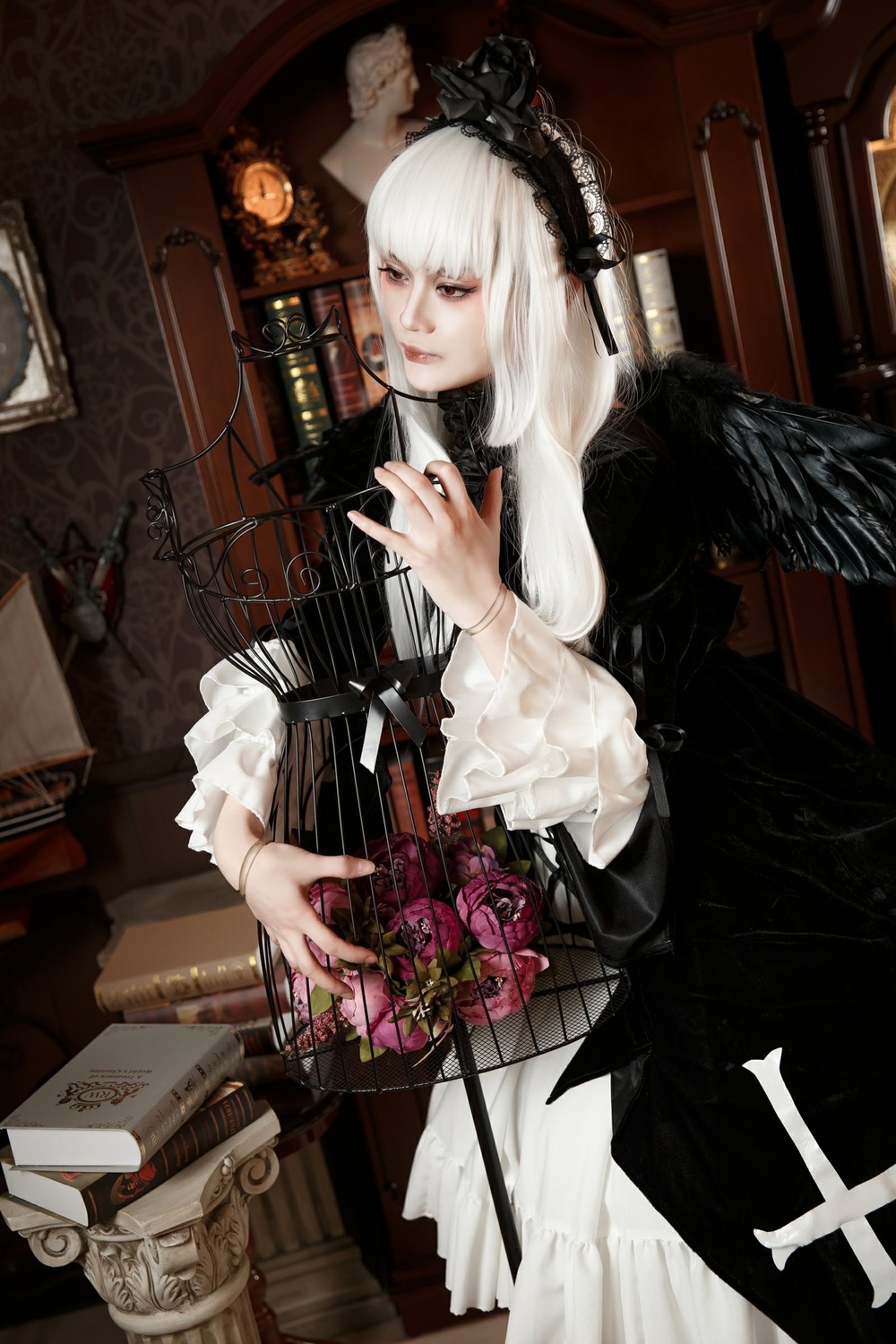 1girl dress flower frills gothic_lolita hairband lolita_fashion long_hair rose solo suigintou white_hair wings