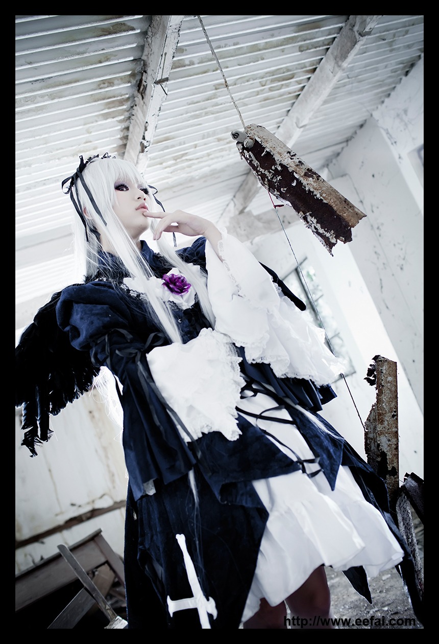 1girl black_border dress frills letterboxed long_hair profile solo suigintou