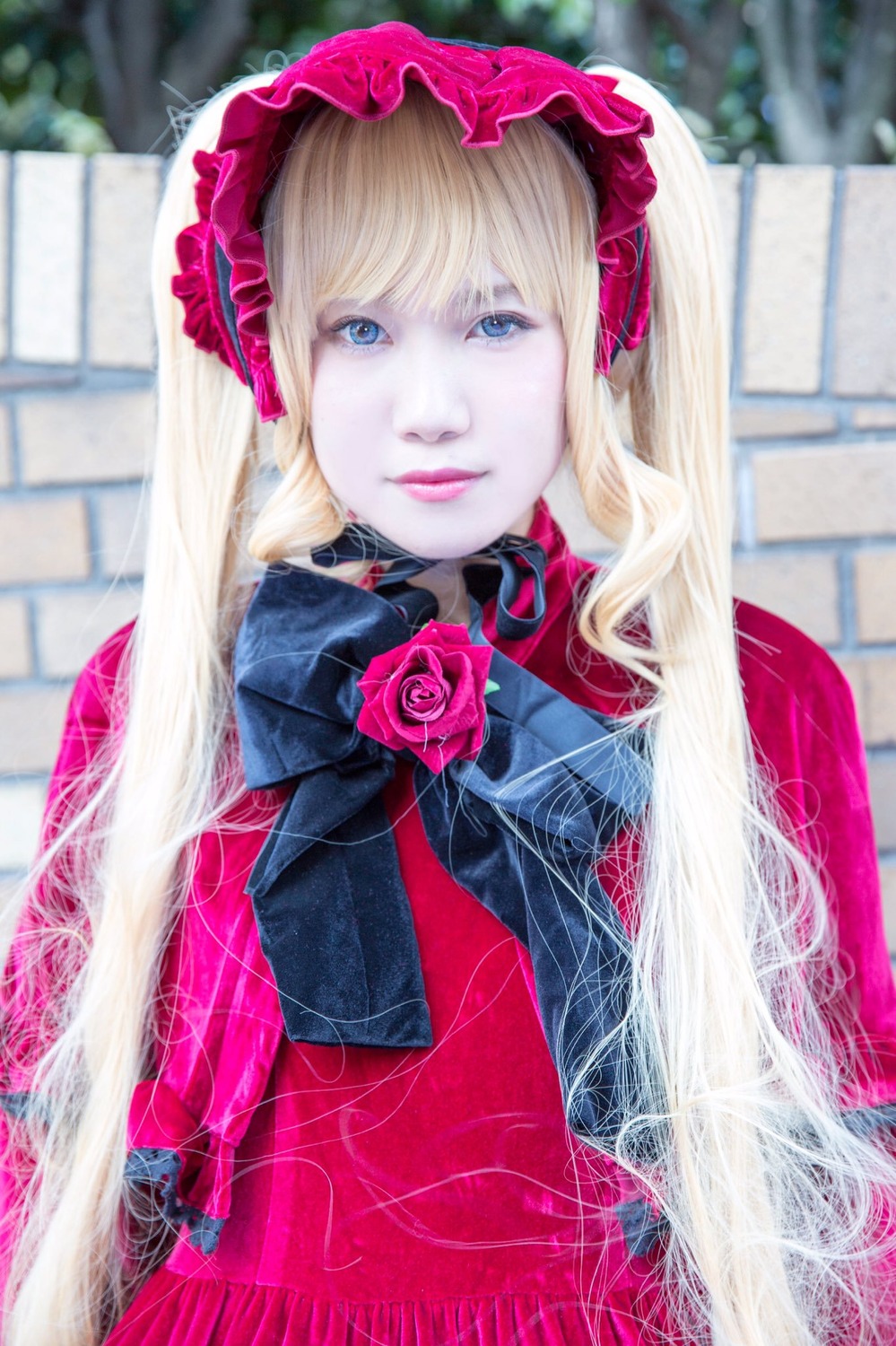1girl blonde_hair blue_eyes blurry blurry_background depth_of_field flower lips long_hair looking_at_viewer outdoors photo pink_flower pink_rose rose shinku solo upper_body