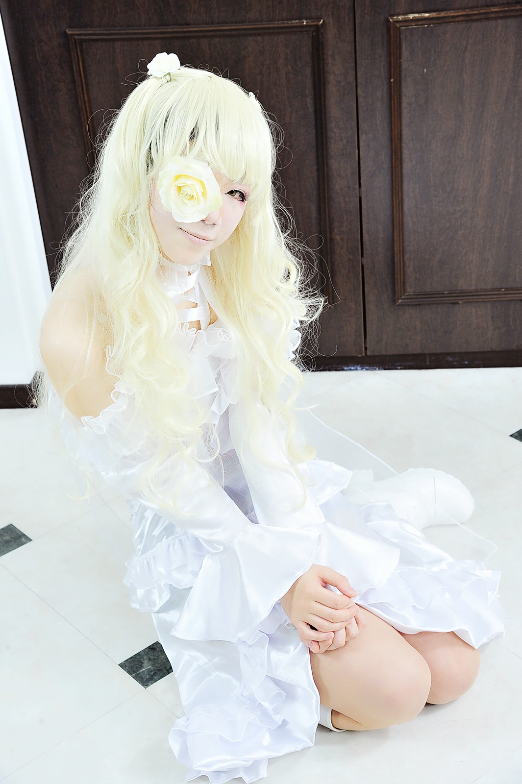 1girl blonde_hair dress kirakishou long_hair sitting solo white_dress white_hair yellow_eyes