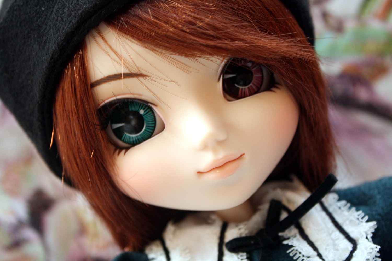 1girl bangs black_headwear blurry blurry_background blurry_foreground closed_mouth depth_of_field doll hat lips looking_at_viewer portrait short_hair smile solo souseiseki