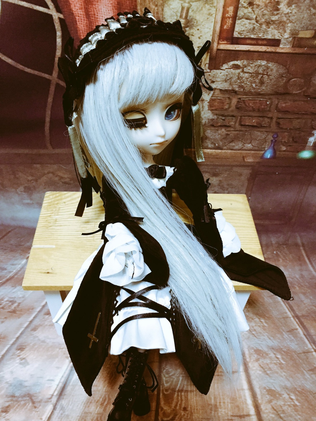 1girl bangs blue_eyes bug butterfly doll dress frills gothic_lolita hairband insect lolita_fashion long_hair solo suigintou