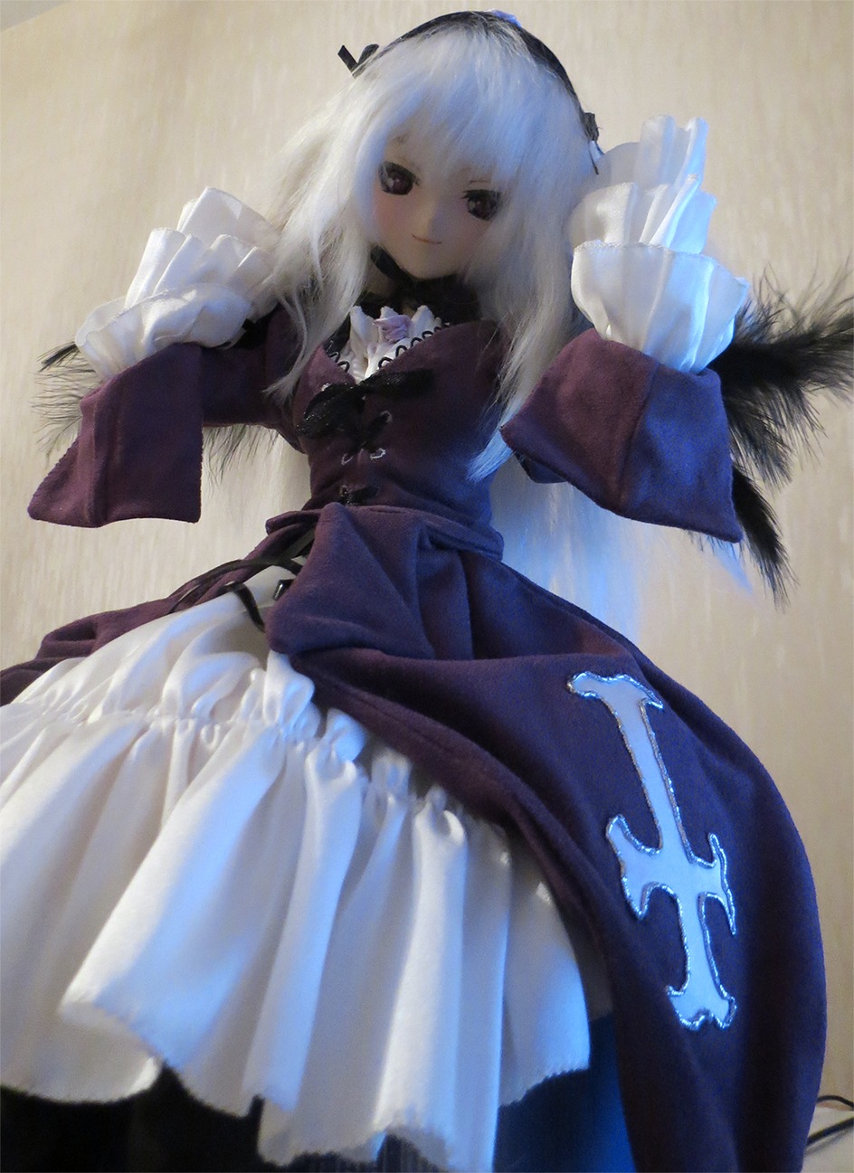 1girl black_dress doll dress frills long_hair long_sleeves looking_at_viewer photo ribbon solo standing suigintou