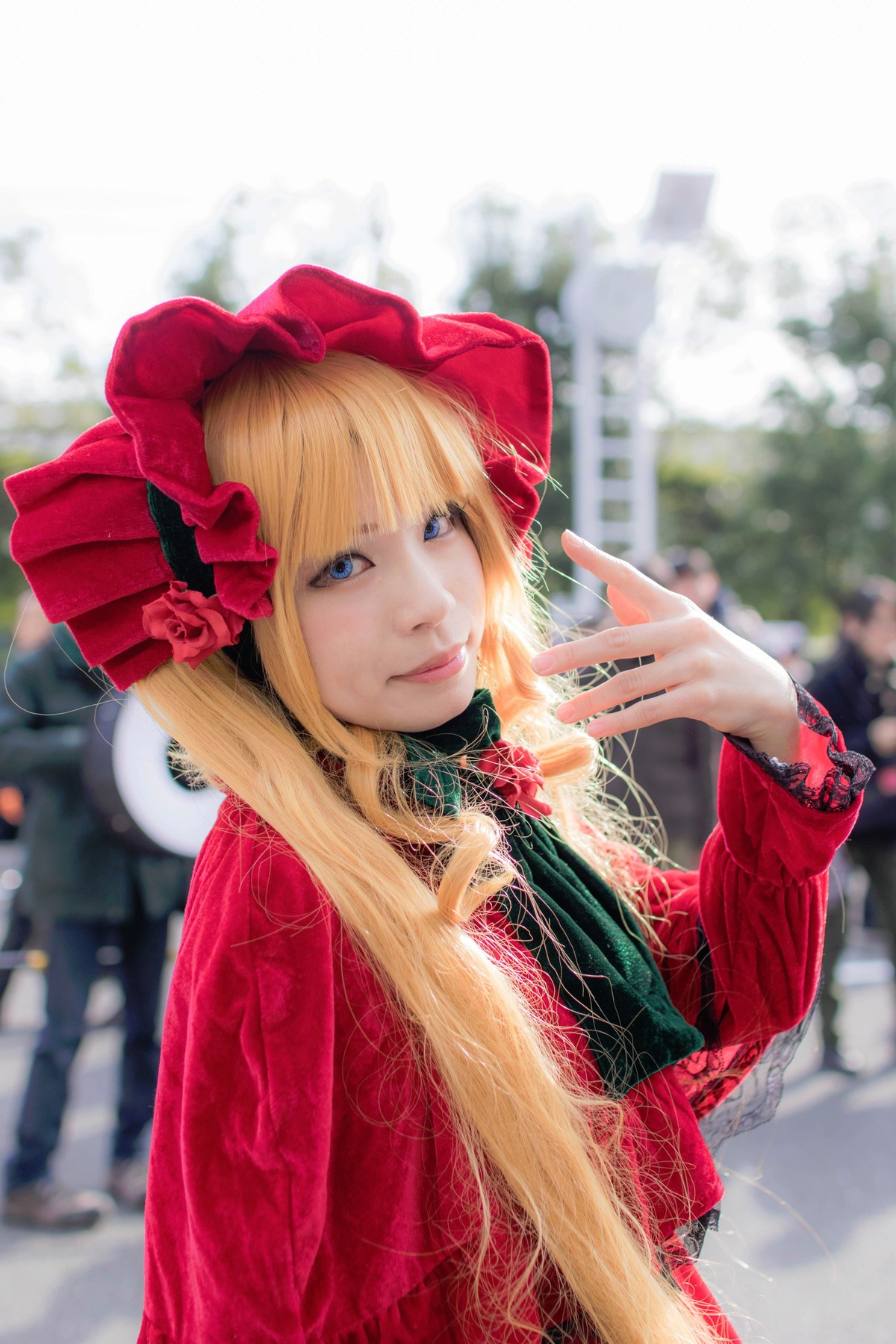 1girl bangs blonde_hair blue_eyes blurry blurry_background bonnet depth_of_field flower hat lips long_hair long_sleeves looking_at_viewer outdoors red_dress shinku solo upper_body