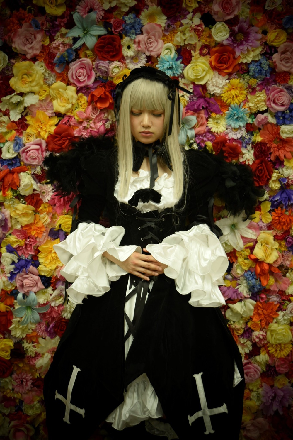 1girl black_dress blonde_hair closed_eyes dress flower gothic_lolita lips lolita_fashion long_hair orange_flower pink_rose purple_rose red_flower red_rose rose solo suigintou yellow_flower yellow_rose