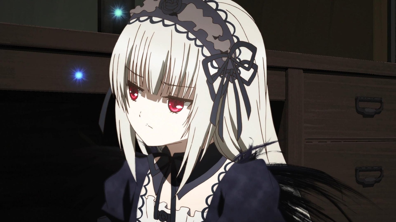 1girl bangs black_ribbon black_wings closed_mouth detached_collar dress eyebrows_visible_through_hair hairband image long_hair long_sleeves looking_at_viewer puffy_sleeves red_eyes ribbon silver_hair solo suigintou wings