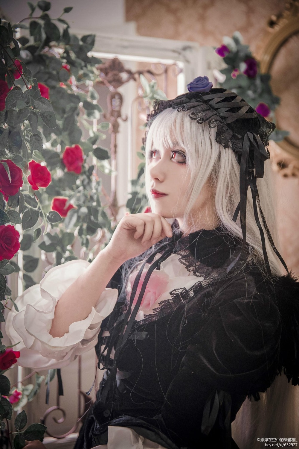 1girl black_dress blurry depth_of_field dress flower gothic_lolita lips lolita_fashion long_hair long_sleeves petals red_eyes red_flower red_rose rose solo suigintou thorns vines white_hair