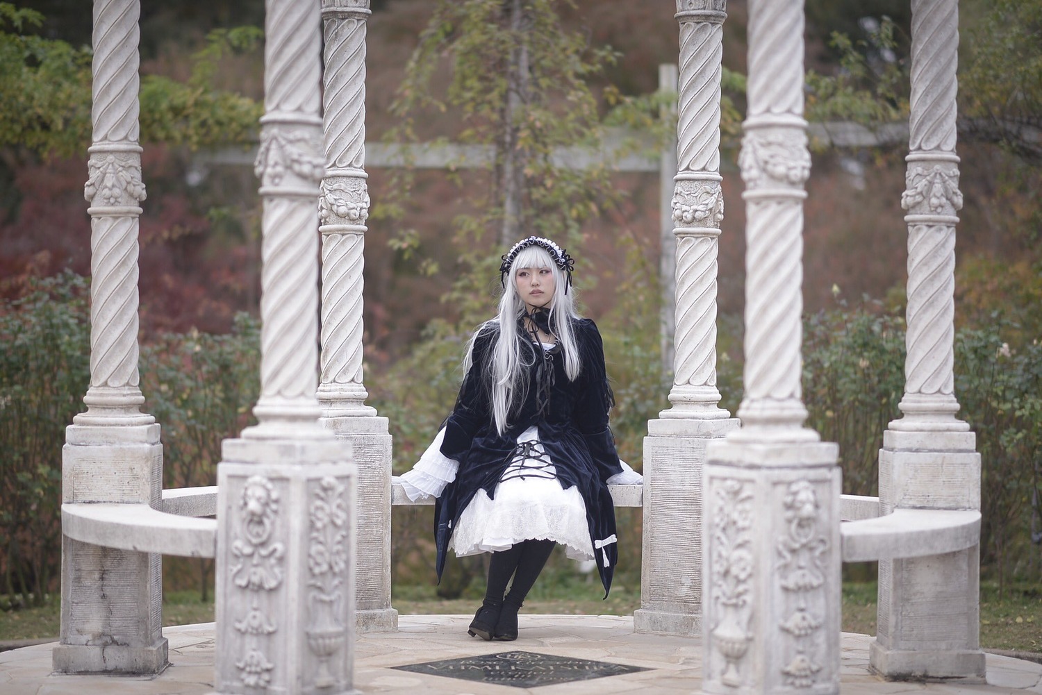 1girl day dress hairband long_hair outdoors photo_background sitting solo suigintou tree very_long_hair