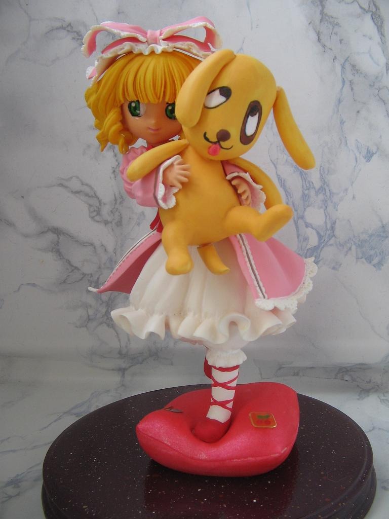 1girl blonde_hair bow doll dress hina_ichigo hinaichigo pink_dress ribbon shoes smile solo stuffed_animal