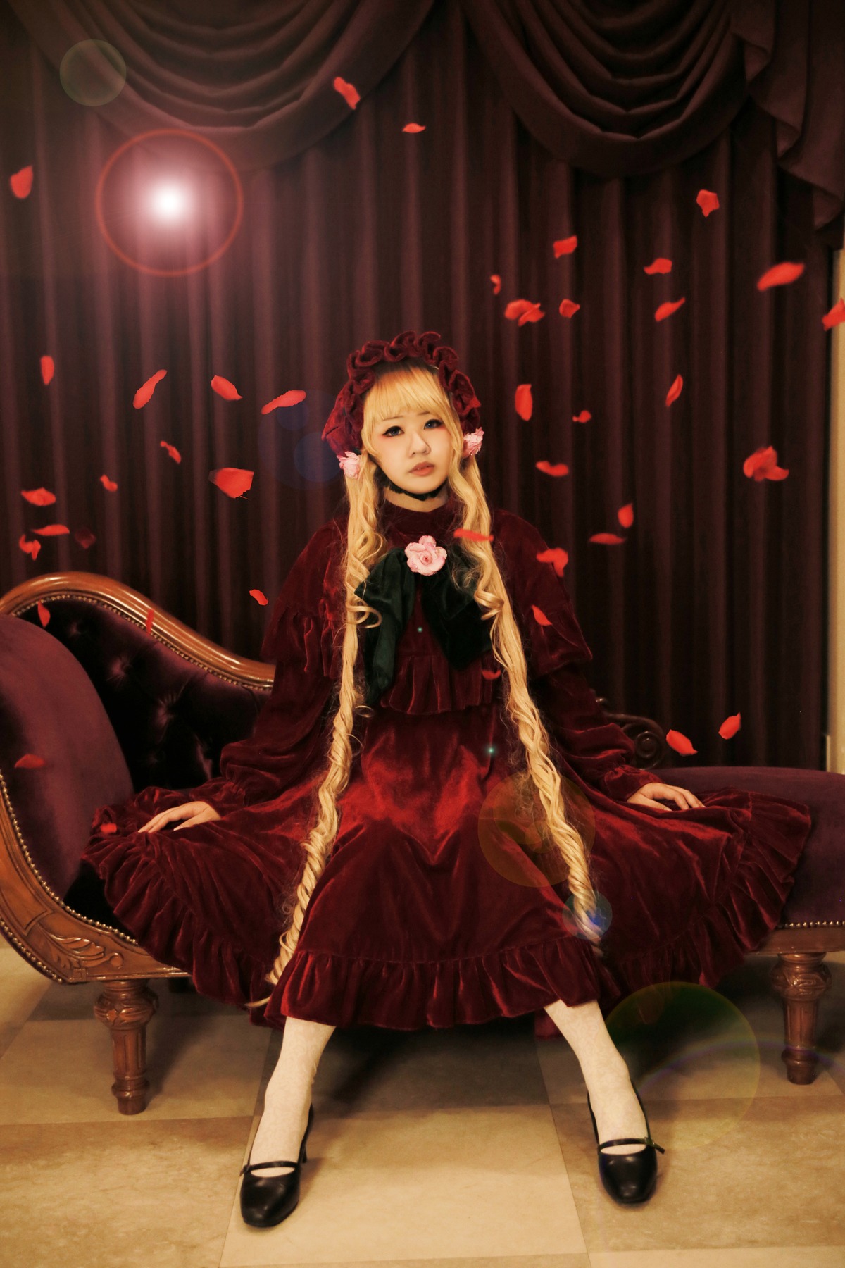 1girl blonde_hair blue_eyes dress flower long_hair petals red_dress rose rose_petals shinku shoes sitting solo