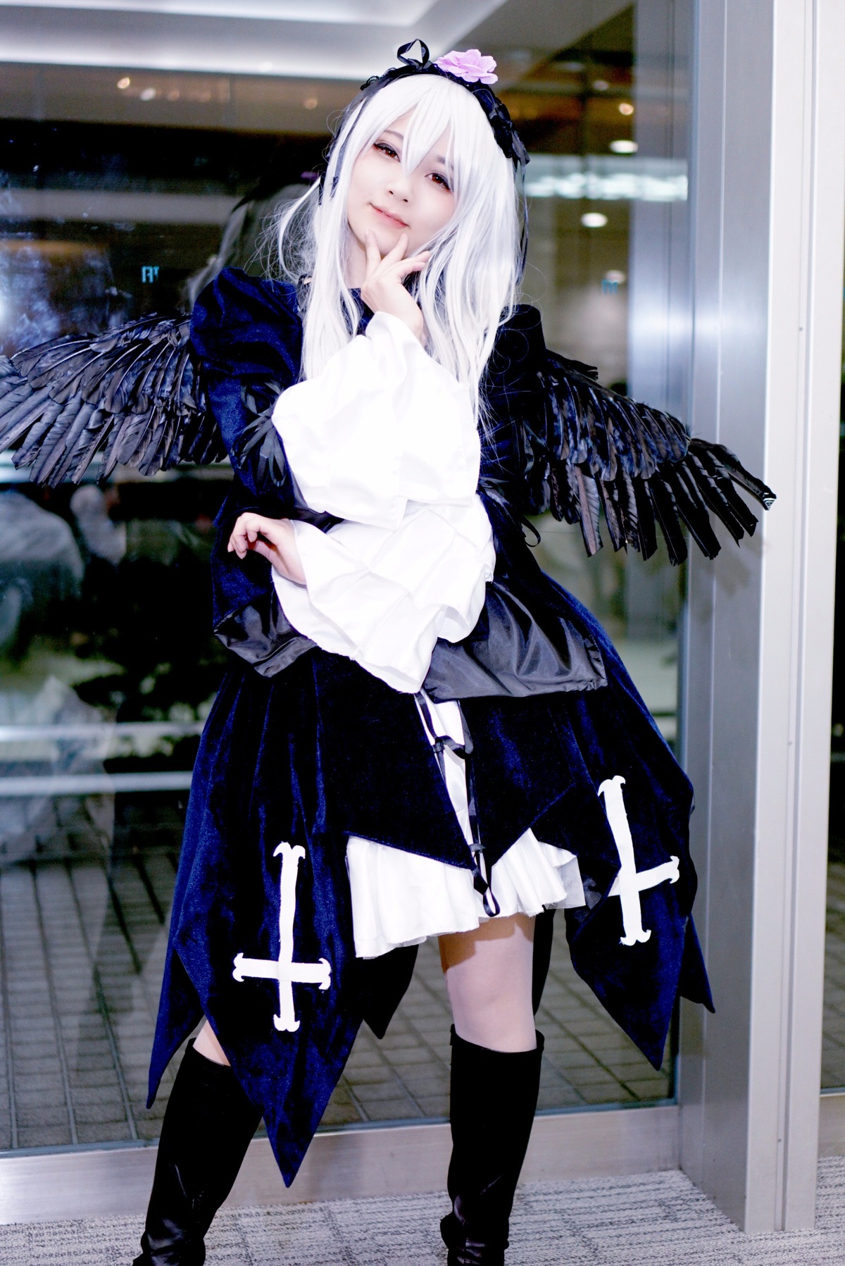 1girl black_legwear black_wings boots dress feathered_wings feathers hairband long_hair solo standing suigintou wings