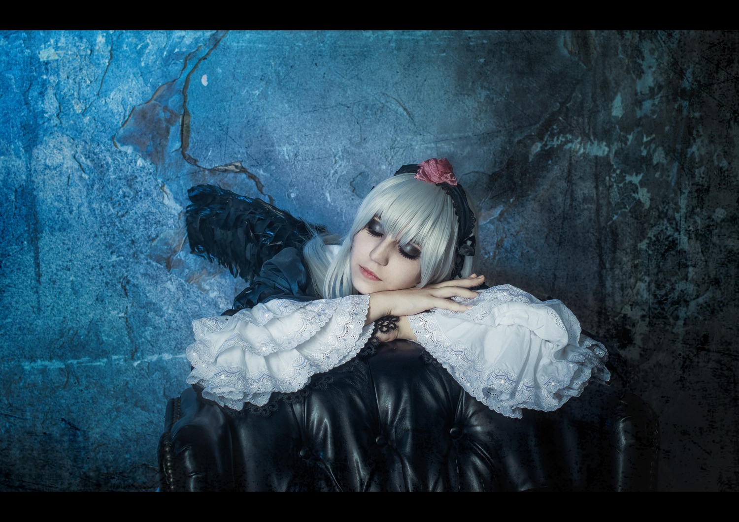 1girl black_border black_dress dress flower frills gothic_lolita letterboxed lips lolita_fashion long_hair long_sleeves solo suigintou