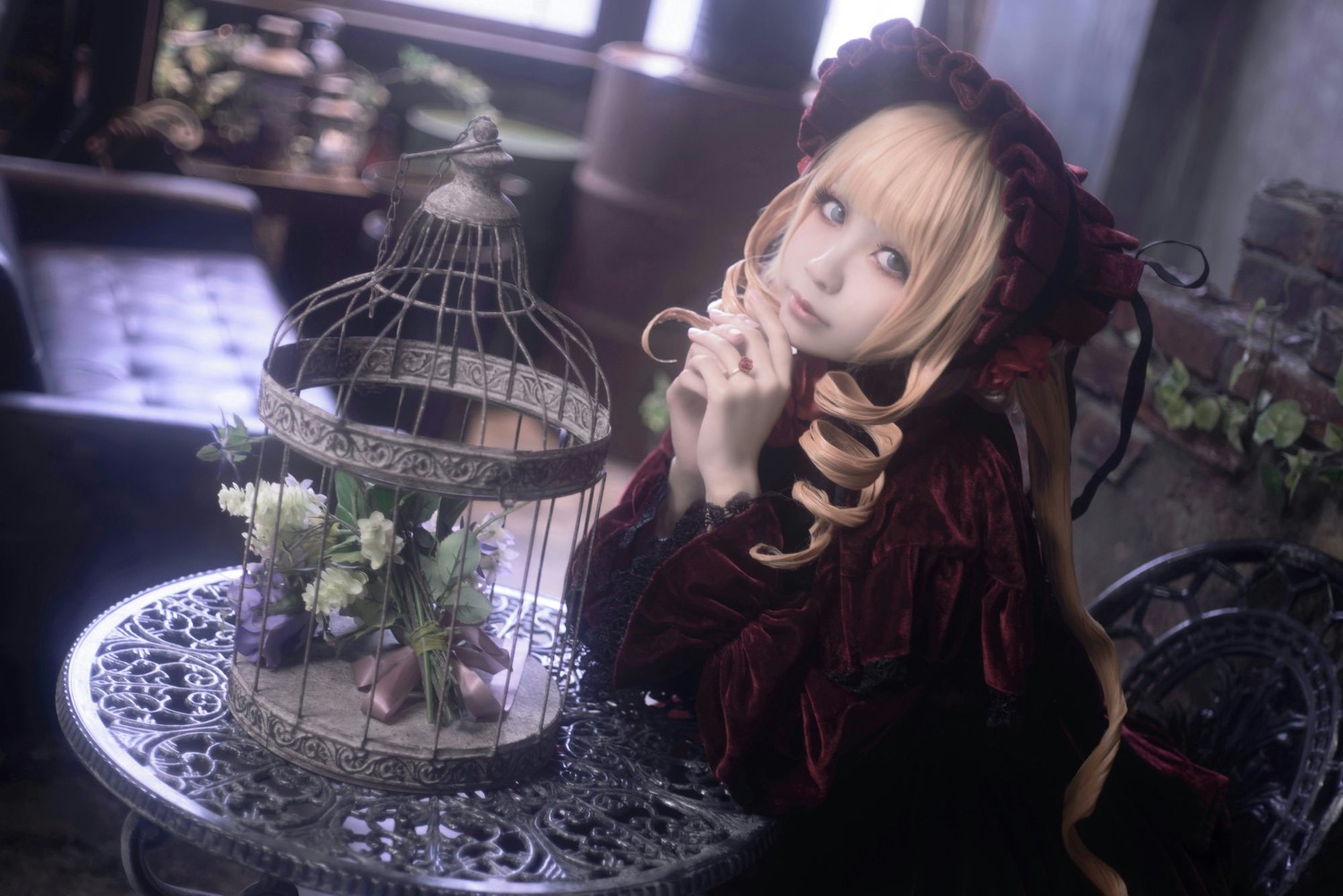 1girl birdcage blonde_hair blue_eyes bonnet cage dress drill_hair flower indoors lips lolita_fashion long_hair looking_at_viewer red_dress shinku solo twin_drills