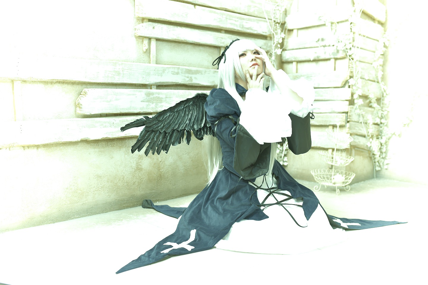 1girl angel_wings black_wings dress feathered_wings long_hair ribbon solo suigintou white_hair wings
