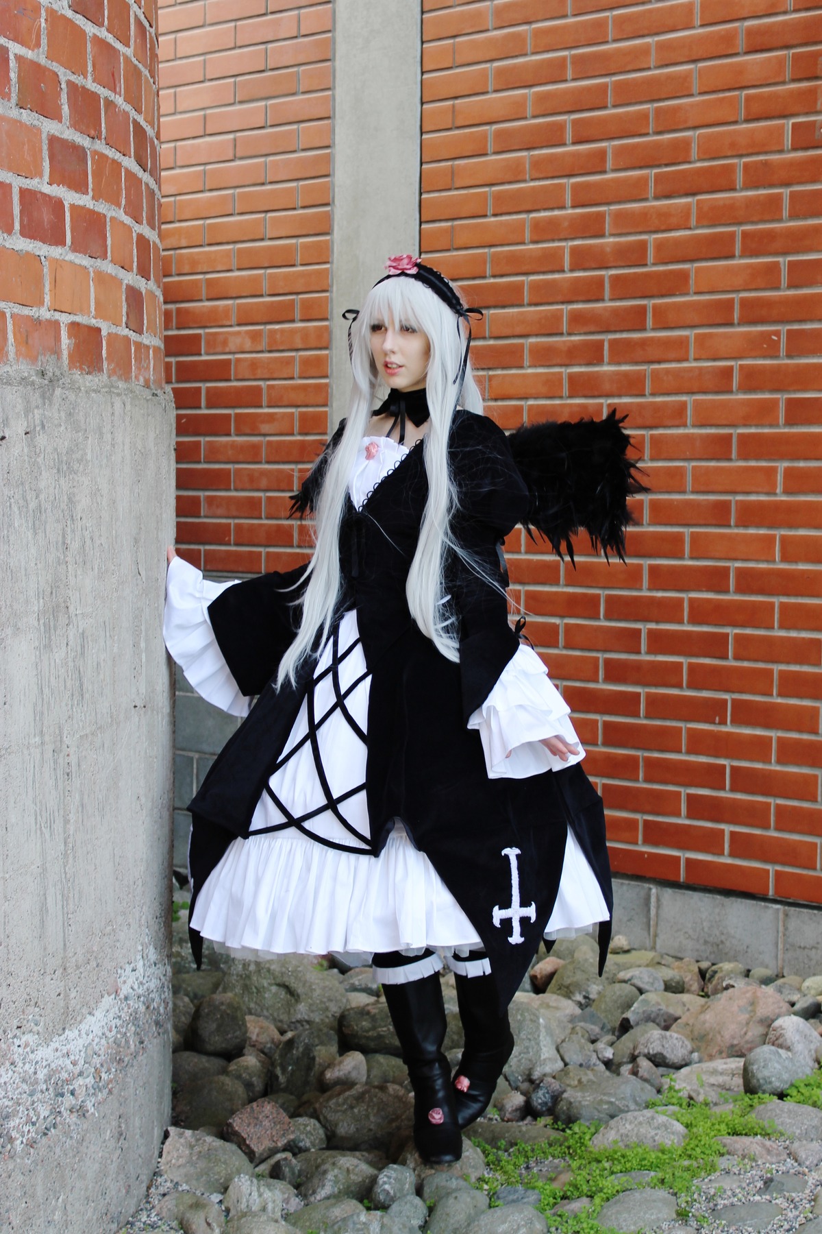 1girl black_footwear boots brick_wall closed_eyes dress flower full_body hat long_hair long_sleeves solo standing suigintou very_long_hair wall white_hair