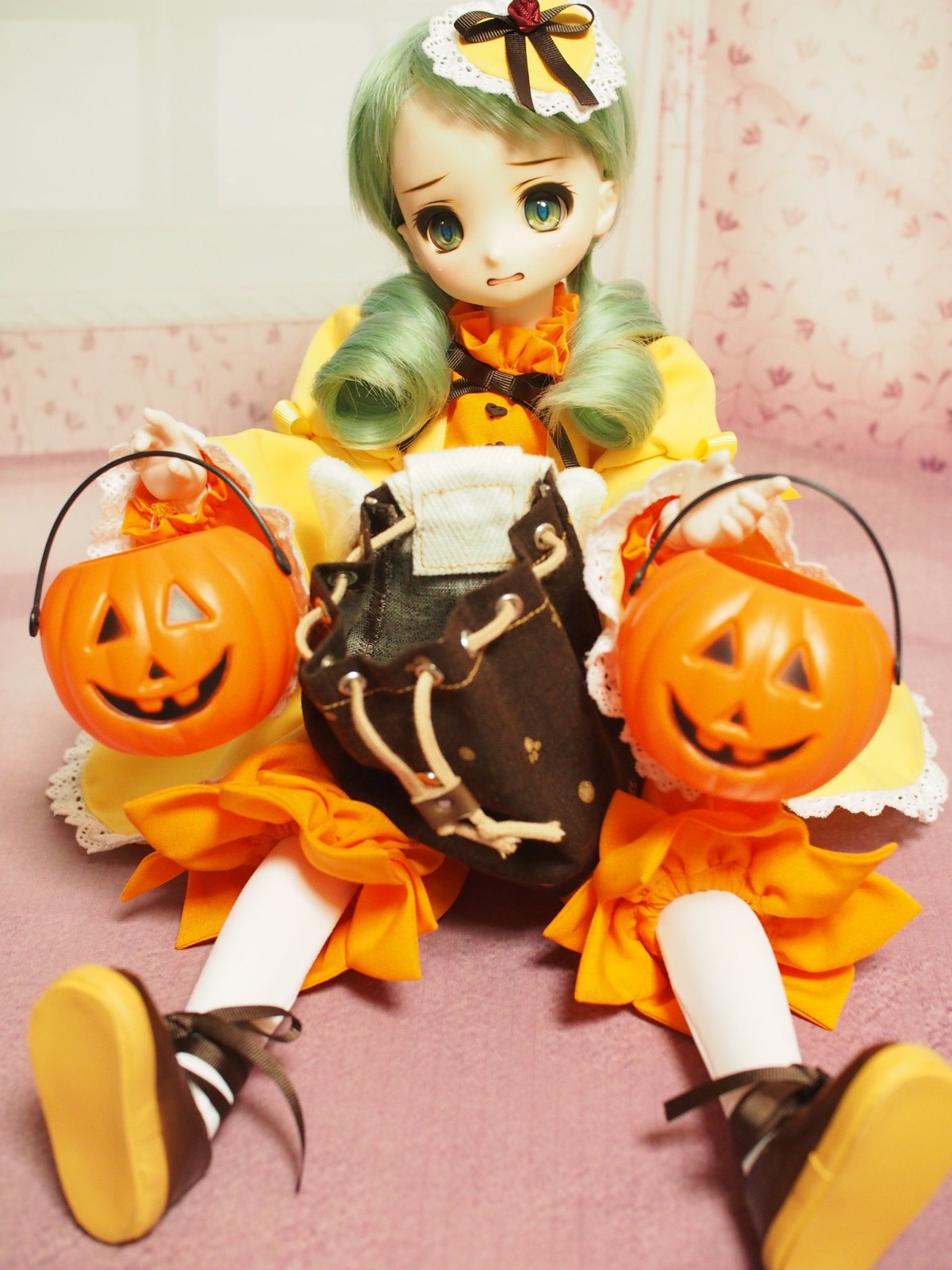 1girl candy doll dress green_eyes green_hair halloween hat jack-o'-lantern kanaria pumpkin sitting solo