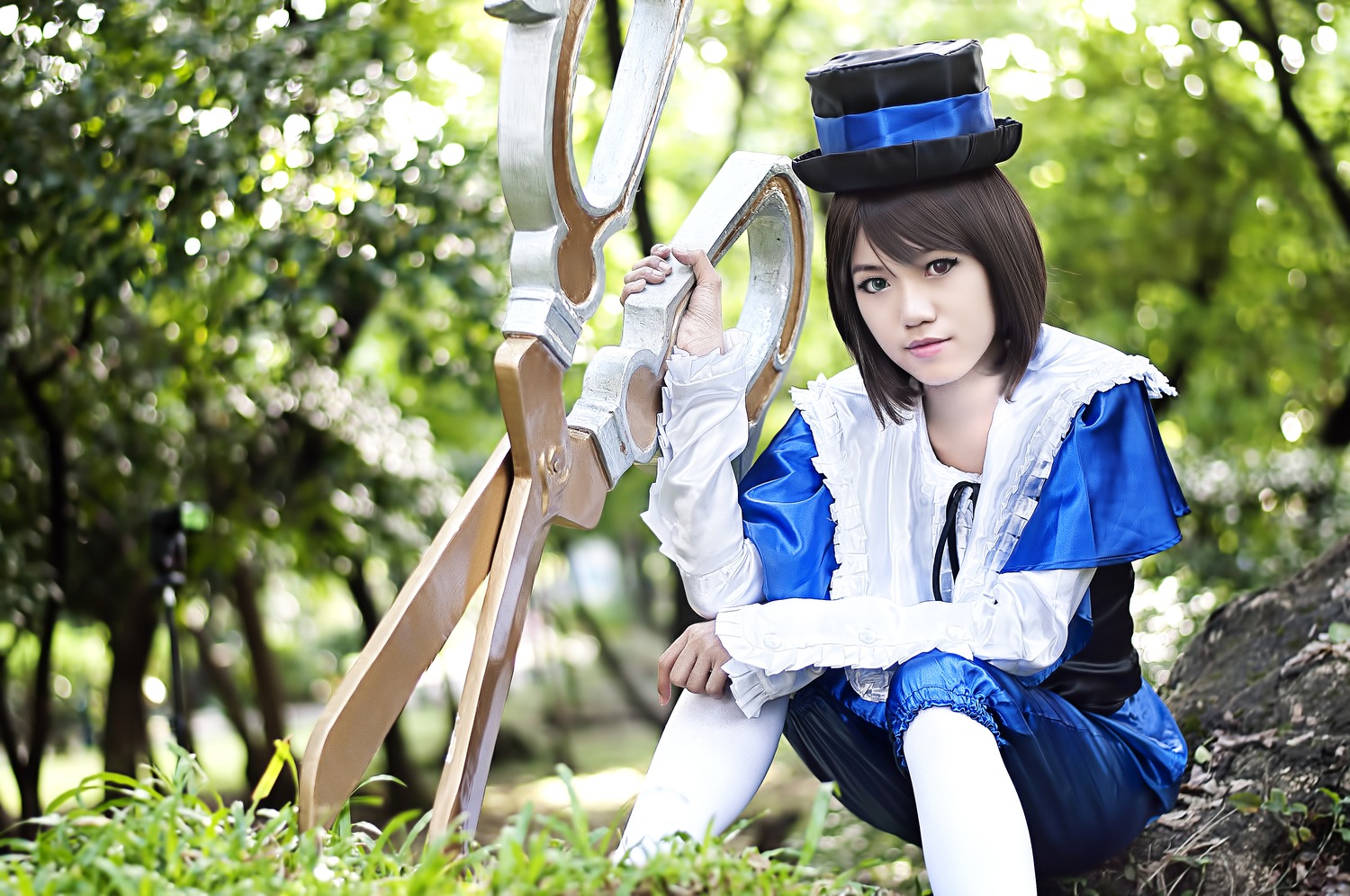 1girl black_hair blue_eyes brown_hair dress flower grass hat lips long_sleeves outdoors short_hair sitting solo souseiseki sword top_hat weapon