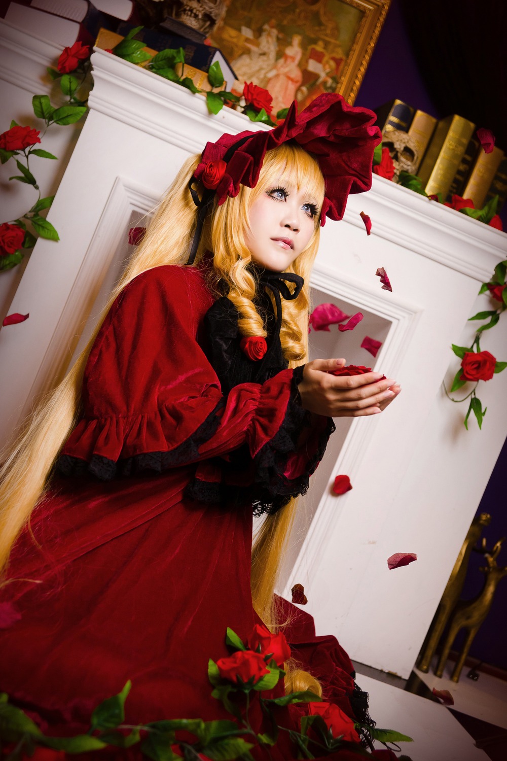 1girl blonde_hair dress drill_hair flower lips long_hair looking_at_viewer petals red_dress red_flower red_rose rose rose_petals shinku solo