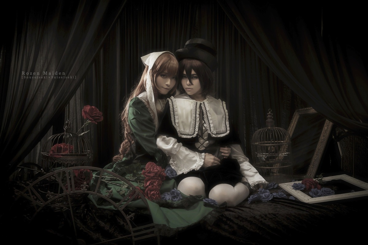 2girls blonde_hair braid brown_hair candle curtains dark dress flower hat indoors long_hair multiple_cosplay multiple_girls red_flower red_rose rose sitting tagme