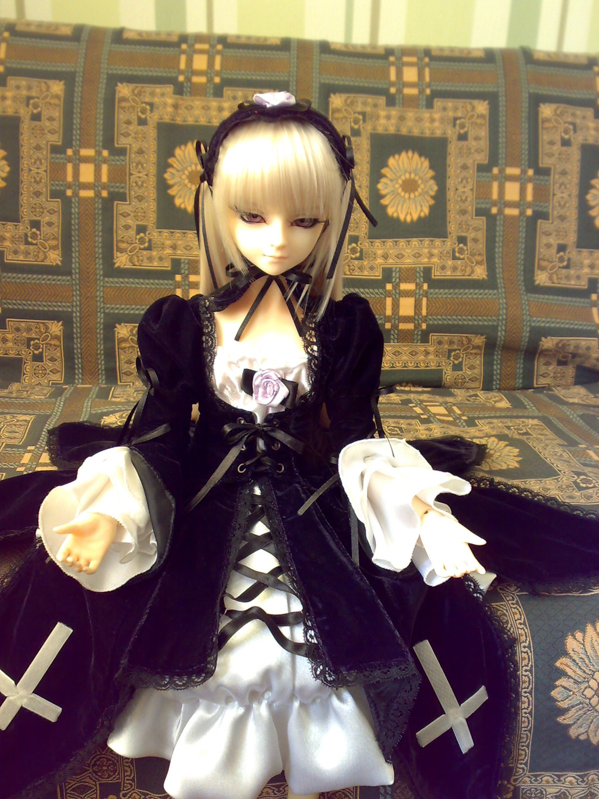 1girl doll dress flower frills long_sleeves pale_skin rose solo suigintou white_hair