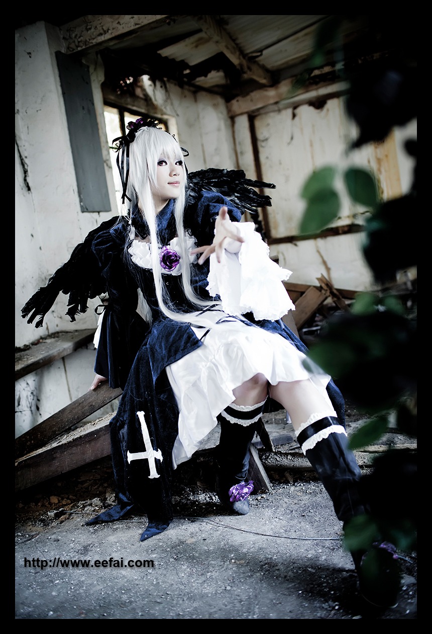 1girl boots dress frills hairband letterboxed sitting solo suigintou white_hair wings