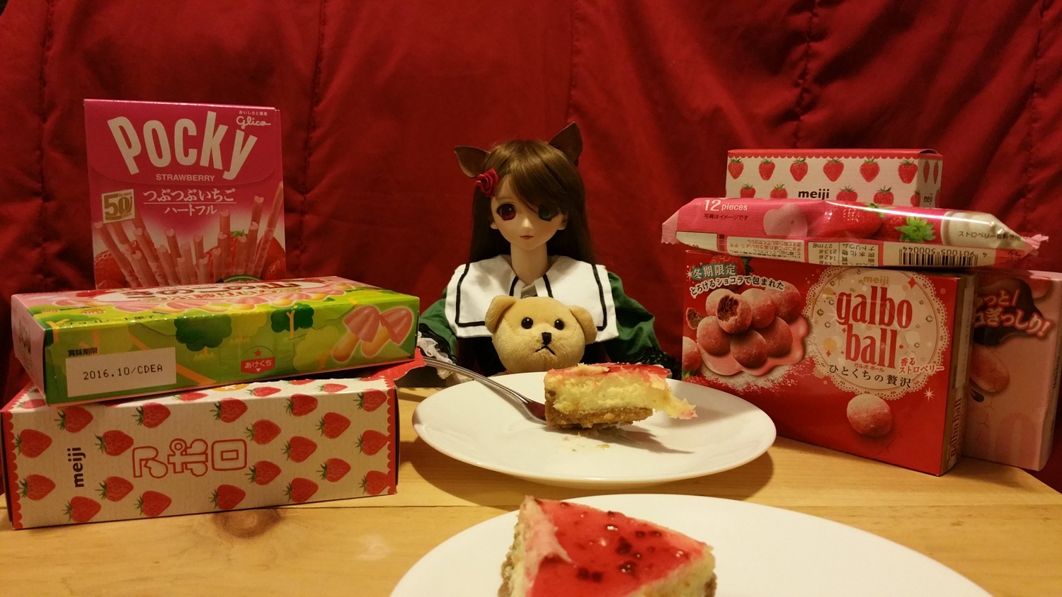 1girl animal_ears bow brown_hair cake cat_ears doll food fruit long_hair solo strawberry suiseiseki table