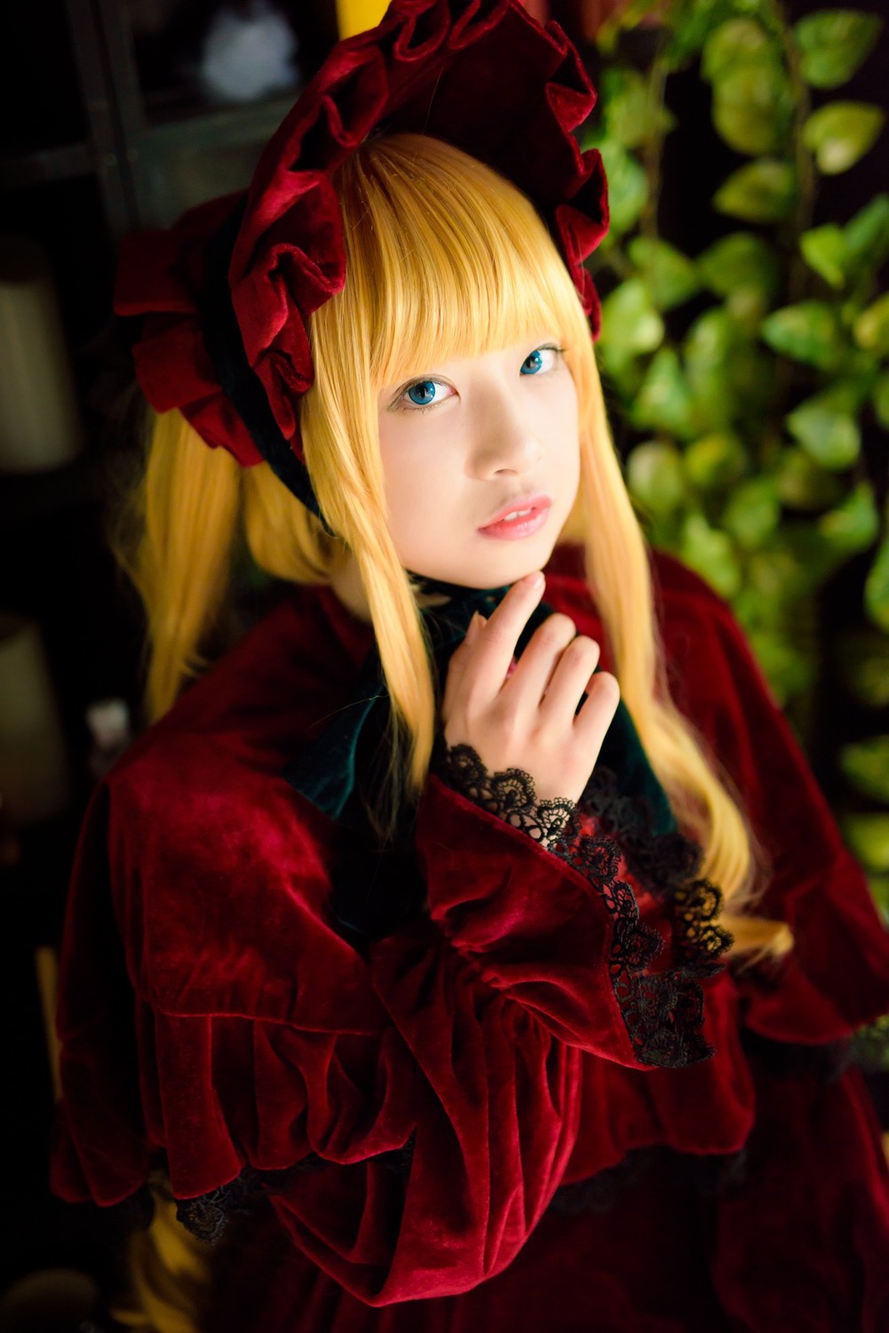 1girl bangs blonde_hair blue_eyes blurry blurry_background depth_of_field dress flower lace lips long_hair long_sleeves looking_at_viewer realistic red_dress shinku solo upper_body