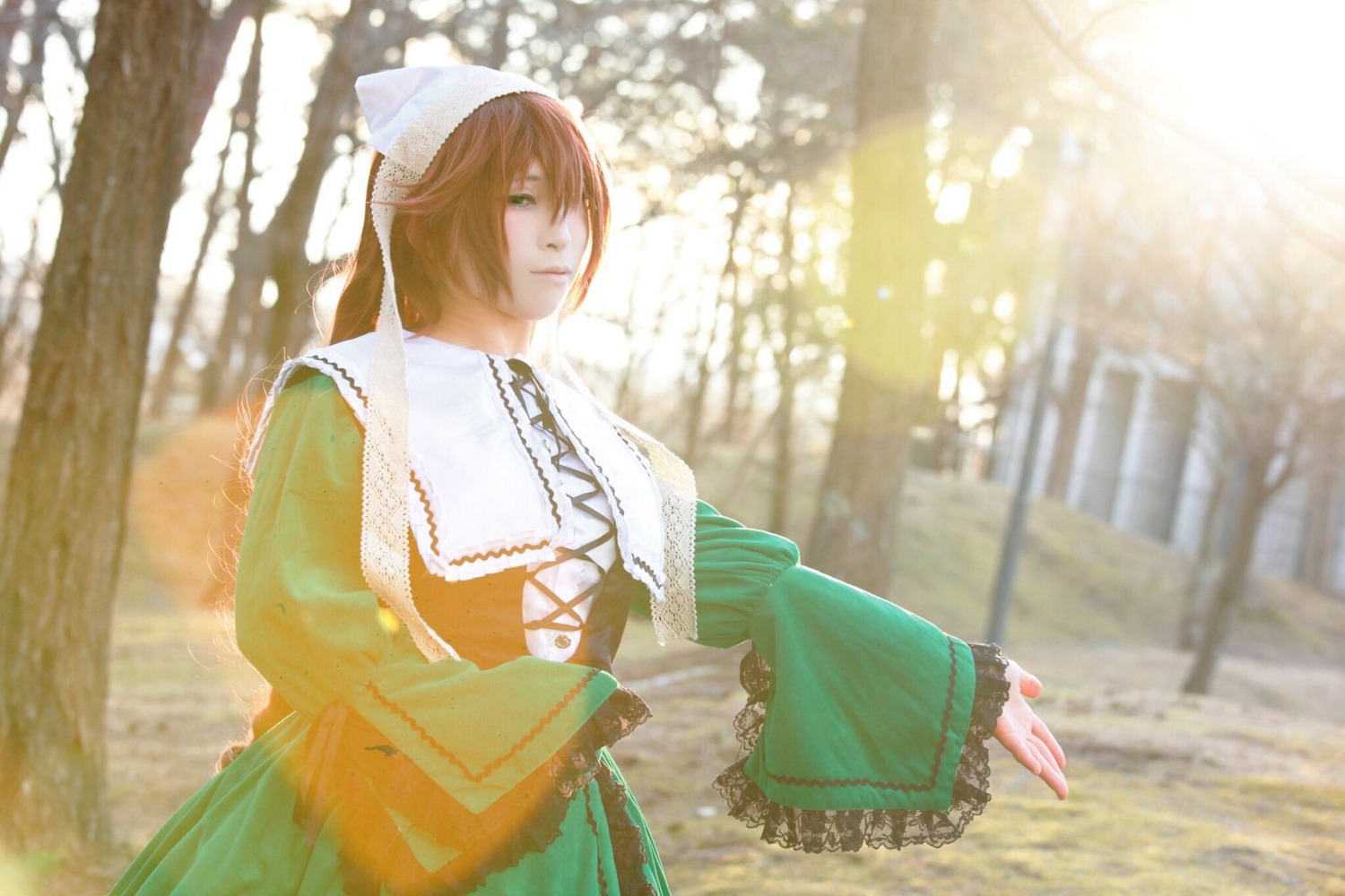 1girl apron blonde_hair blurry brown_hair depth_of_field dress green_dress green_eyes head_scarf long_sleeves outdoors solo suiseiseki