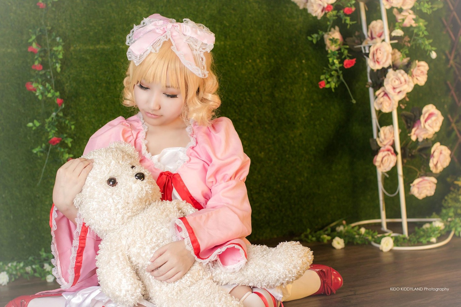 1girl blonde_hair bow bunny closed_eyes dog dress flower frills grass hinaichigo long_sleeves mary_janes pink_dress pink_rose plant red_flower red_rose rose shoes solo