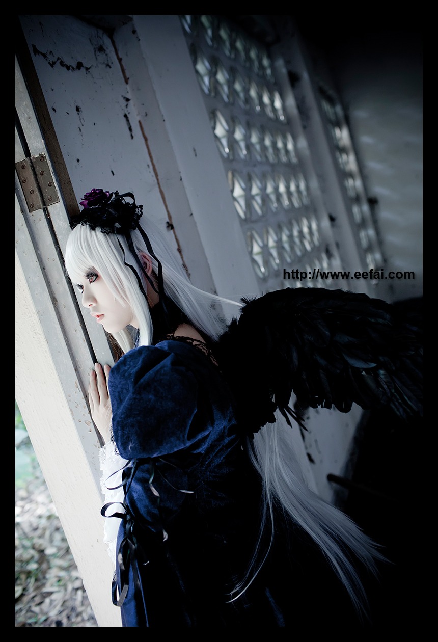 1girl black_dress dress feathers flower gothic_lolita letterboxed lips long_hair long_sleeves profile solo suigintou wings