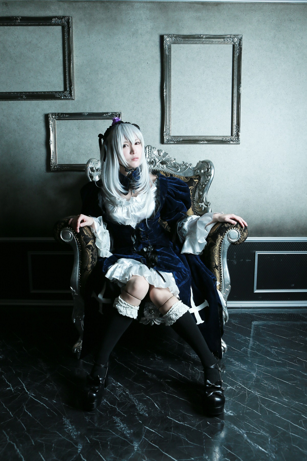 1girl boots crossed_legs dress frills gothic_lolita lolita_fashion long_hair sitting solo suigintou