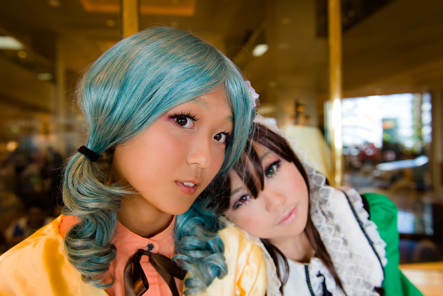 2girls blue_hair blurry blurry_background brown_eyes depth_of_field drill_hair indoors lips looking_at_viewer multiple_cosplay multiple_girls photo portrait realistic ribbon smile tagme