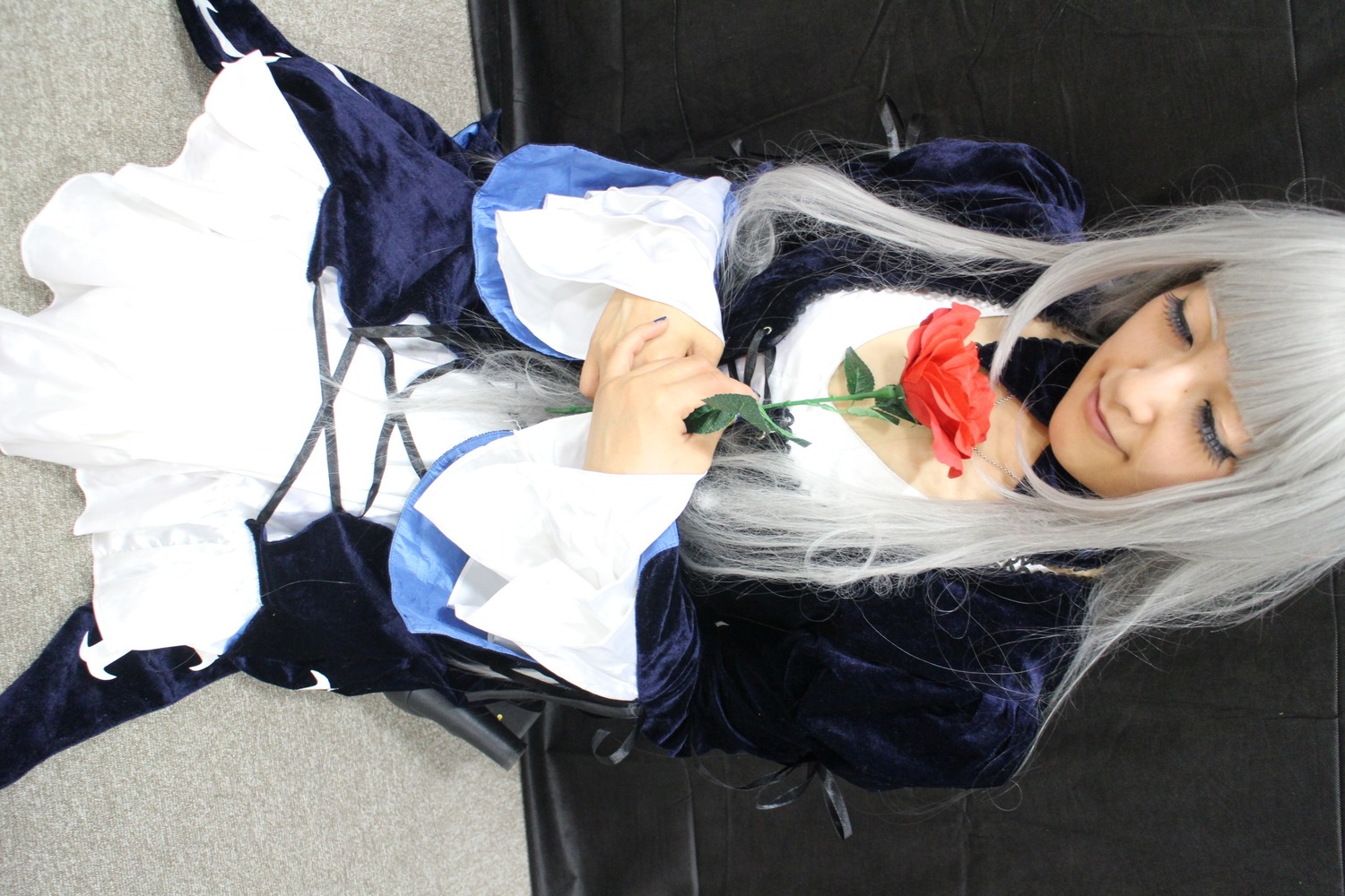 1girl closed_eyes dress flower long_hair rose sitting smile solo suigintou