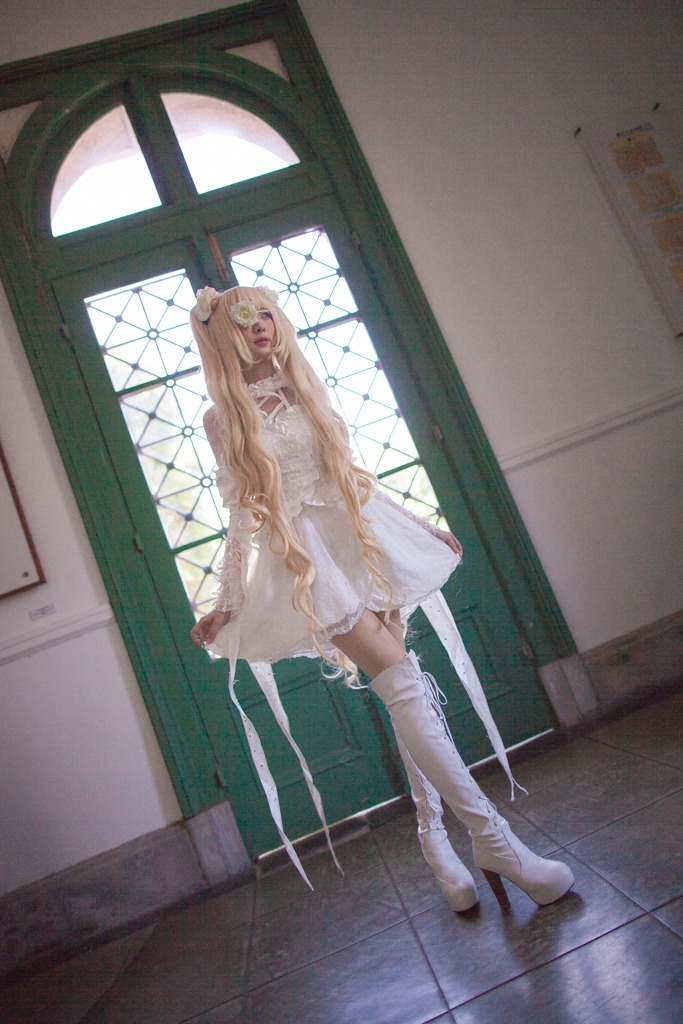 1girl blonde_hair doll_joints dress indoors joints kirakishou long_hair solo standing tile_floor tiles very_long_hair white_dress window