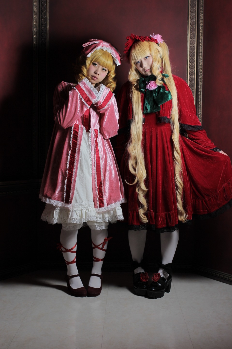 2girls black_footwear blonde_hair blue_eyes bow dress flower long_hair long_sleeves looking_at_viewer multiple_cosplay multiple_girls pantyhose red_dress rose shoes siblings sisters standing striped tagme twins white_legwear