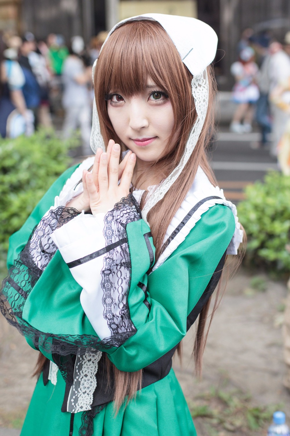 1girl 3d blurry blurry_background blurry_foreground brown_hair depth_of_field dress figure lips looking_at_viewer outdoors photo photo_background photorealistic realistic solo solo_focus suiseiseki