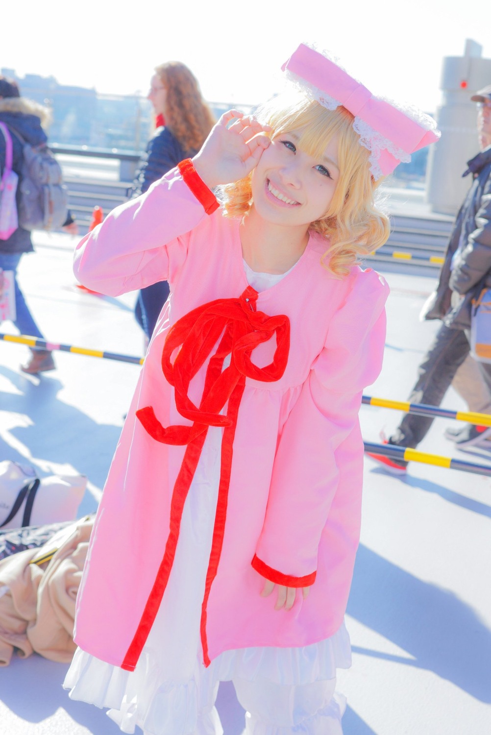 1girl blonde_hair blue_eyes blurry day depth_of_field dress hat hinaichigo outdoors ribbon smile solo