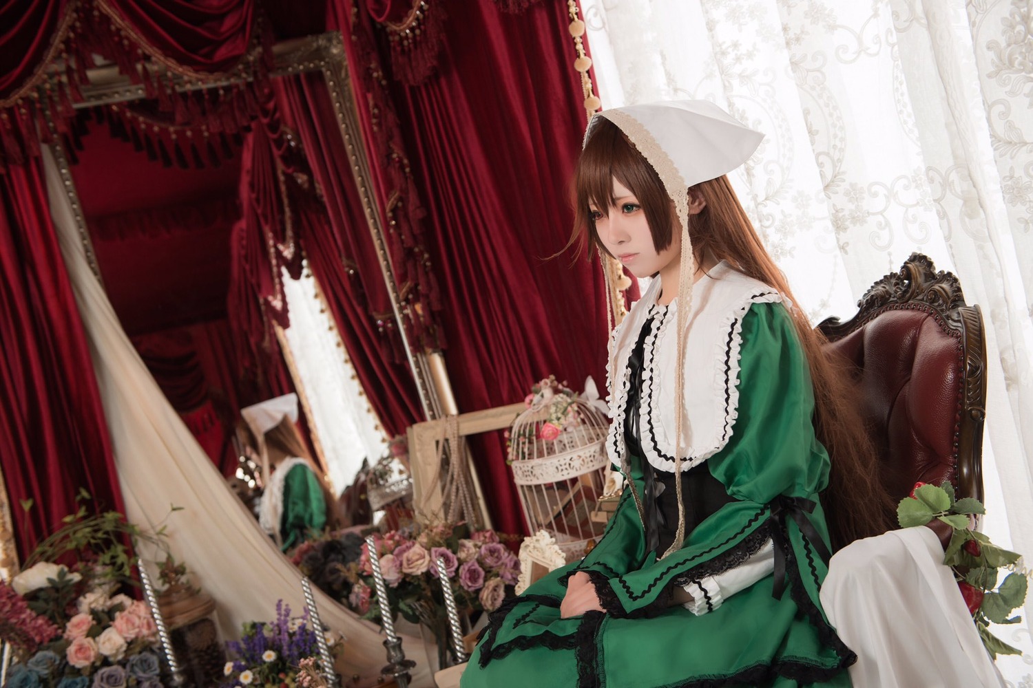 1girl brown_hair curtains dress flower green_dress green_eyes indoors long_hair long_sleeves rose sitting solo suiseiseki vase window